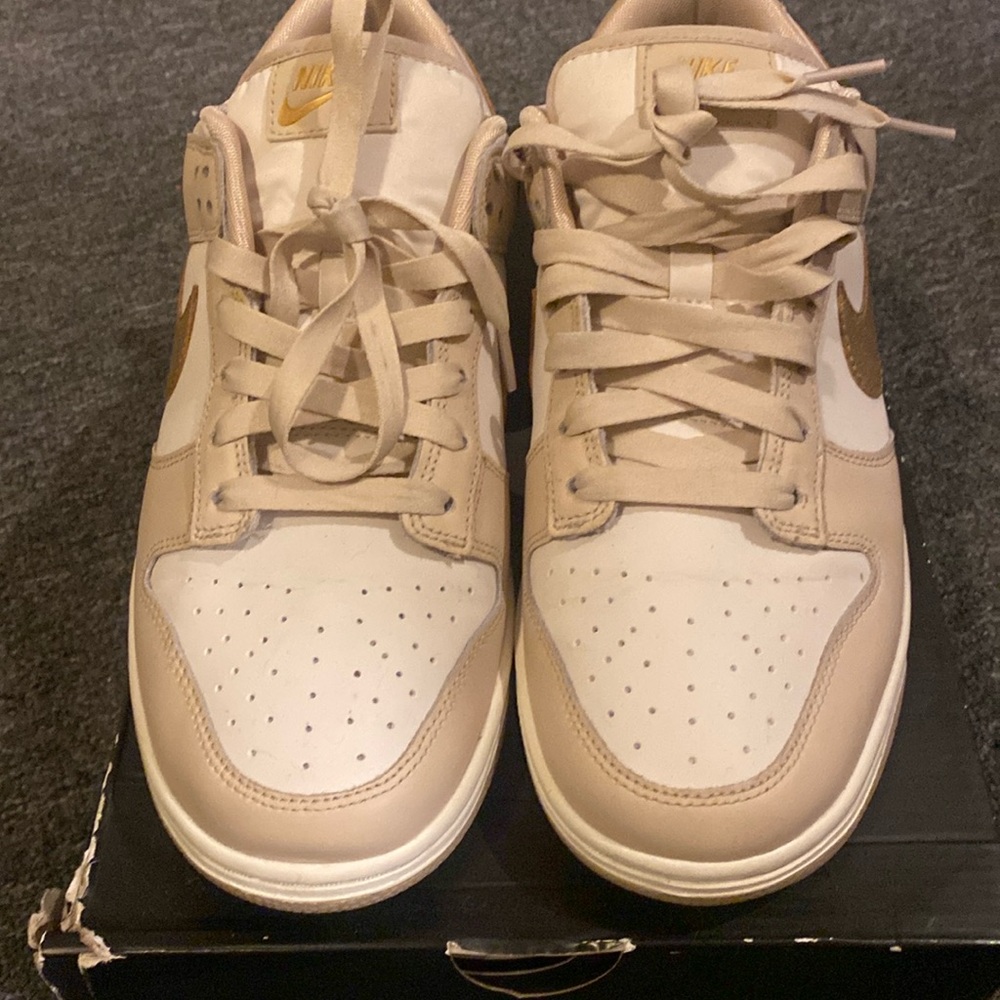 Tan and white NIKE Dunks